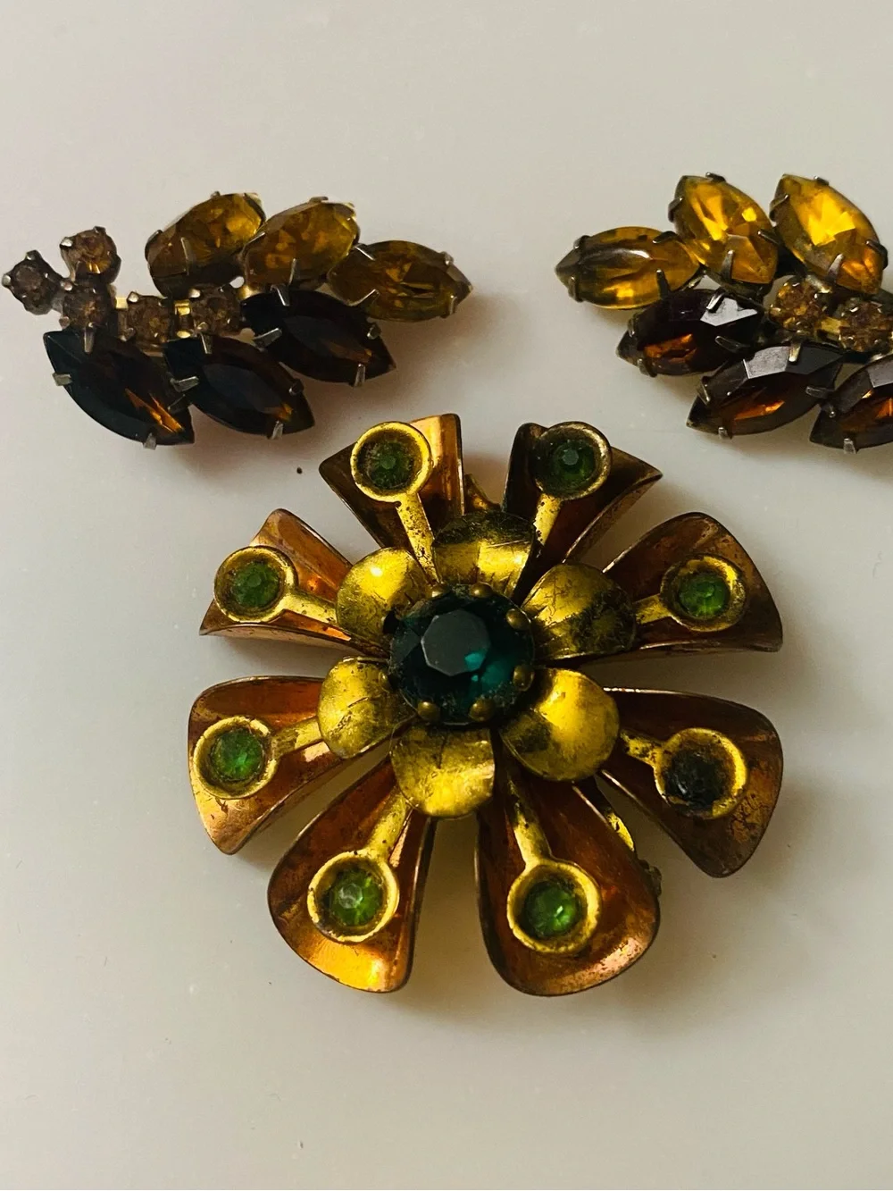 Gold Tone Flower Brooch with Green Rhinestones - and Gold Tone Clip Ons